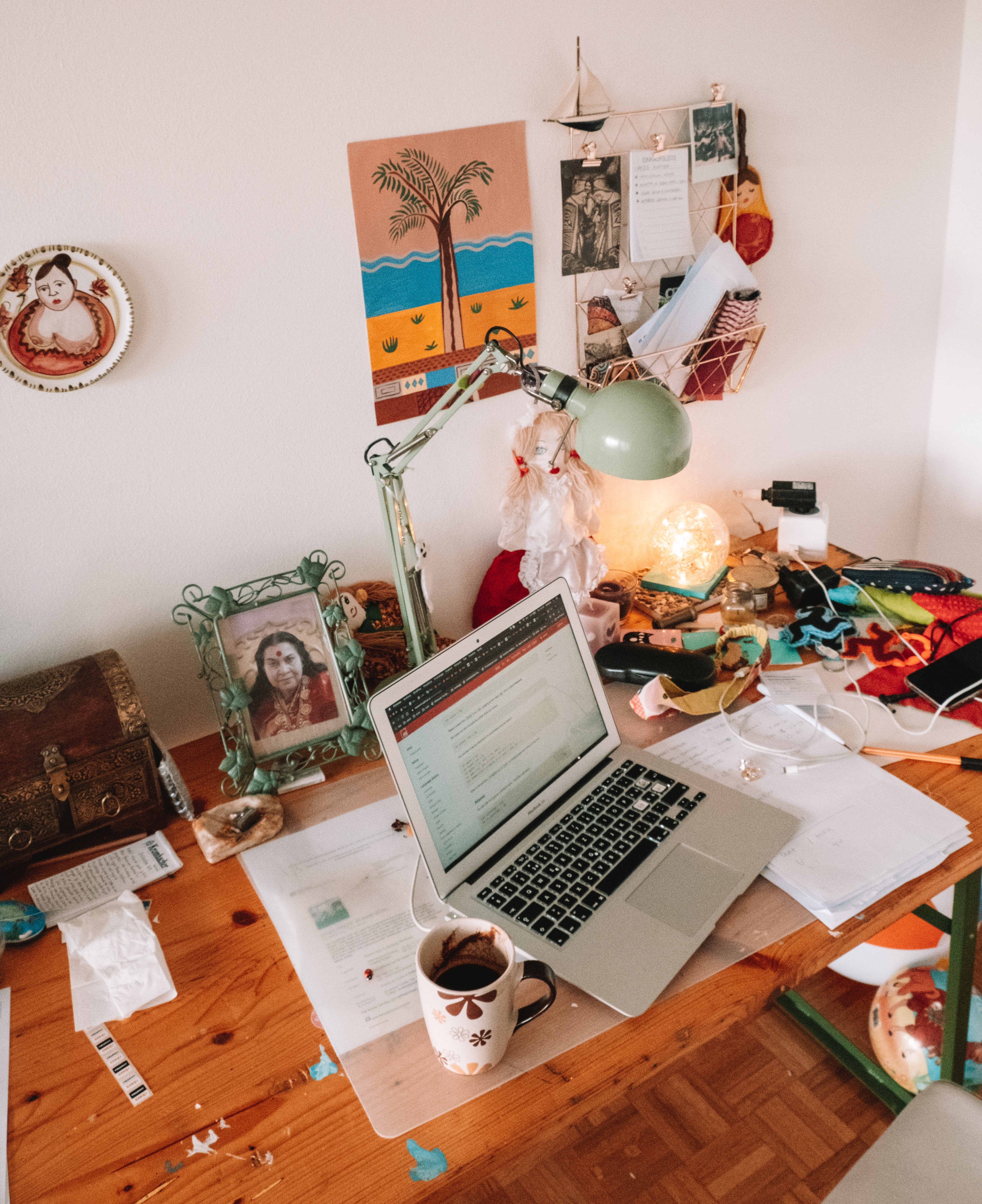 Laptop on Table Beside Mug